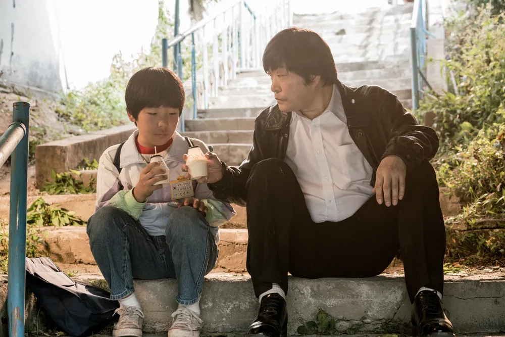 『普通の人』の場面写真